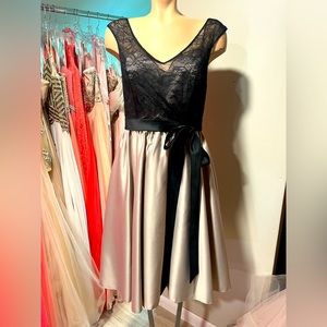 Black Lacy Top over Cappuccino Skirt. Size 10.
